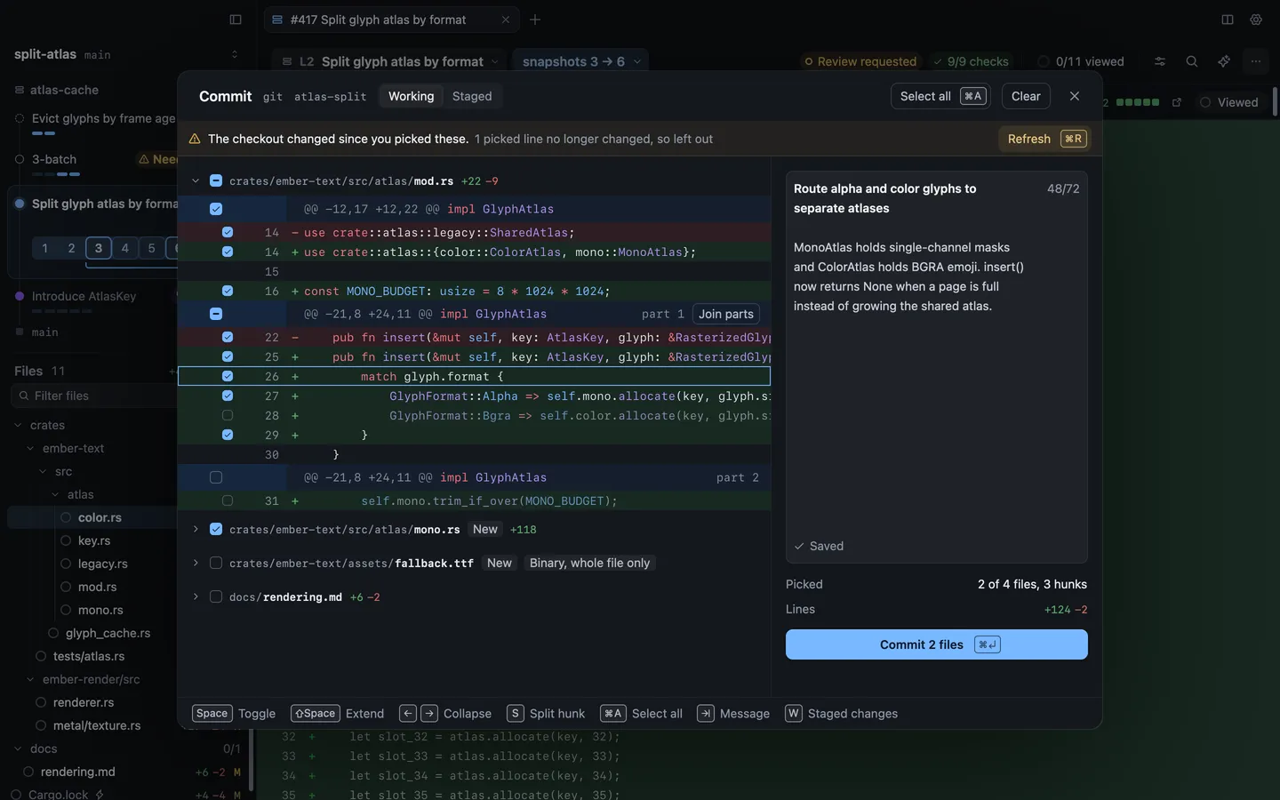 The commit sheet with two files picked, one hunk split into two parts, a commit message on the right and the Commit 2 files button